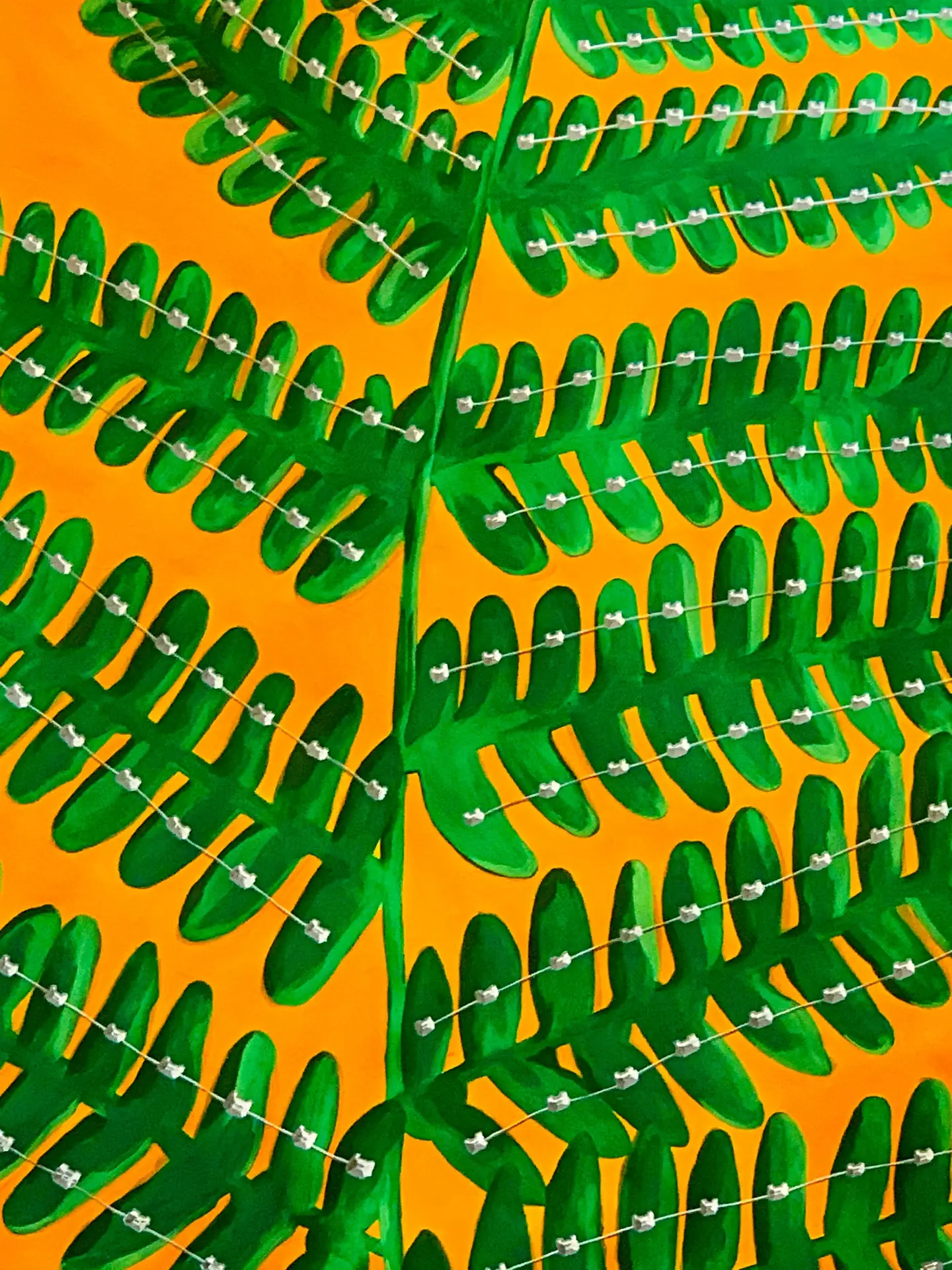 Painting of a fern with braces on its leaves, mixed media